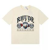 Rhude USA Sailing Crest Graphic Cream Short Sleeve T‑Shirt