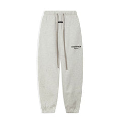 Fog Essentials Black‑Logo Light Oat Heather‑Grey Relaxed‑Fit Tapered Sweatpants