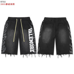 VALEFOREVER Black Washed Denim Shorts with White Graphic Print